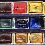 Photo of my Winsor & Newton field paint box with names of customised colour paletteColours in Winsor & Newton paint box