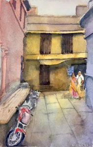 Watercolour painting by Ann Williams of a back street in Varanasi, India